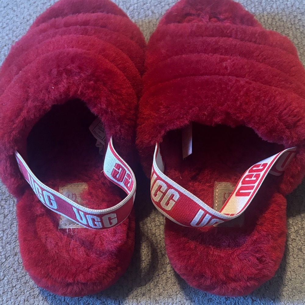 UGG Kids Red Fluffy Slippers. Slightly worn.